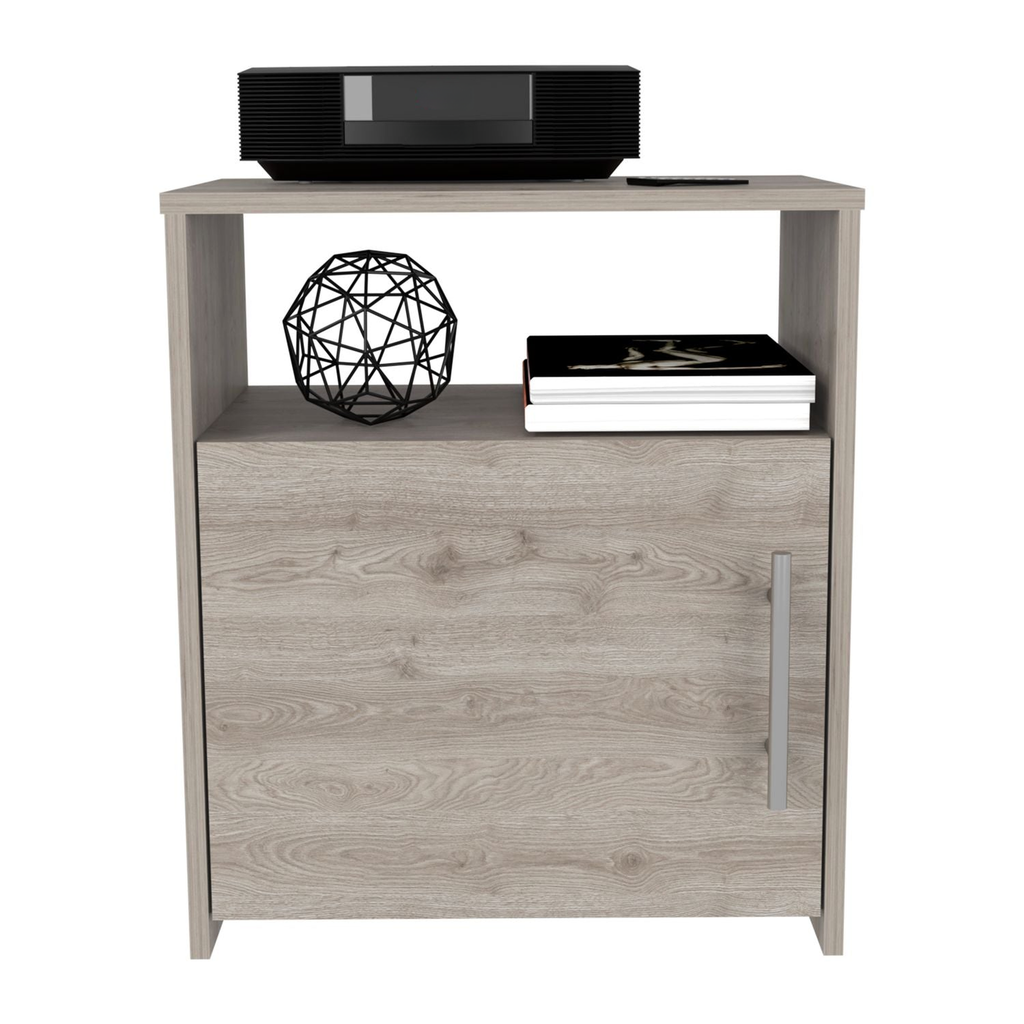 Light wood veneer nightstand with one door and open shelving holding a black stereo system