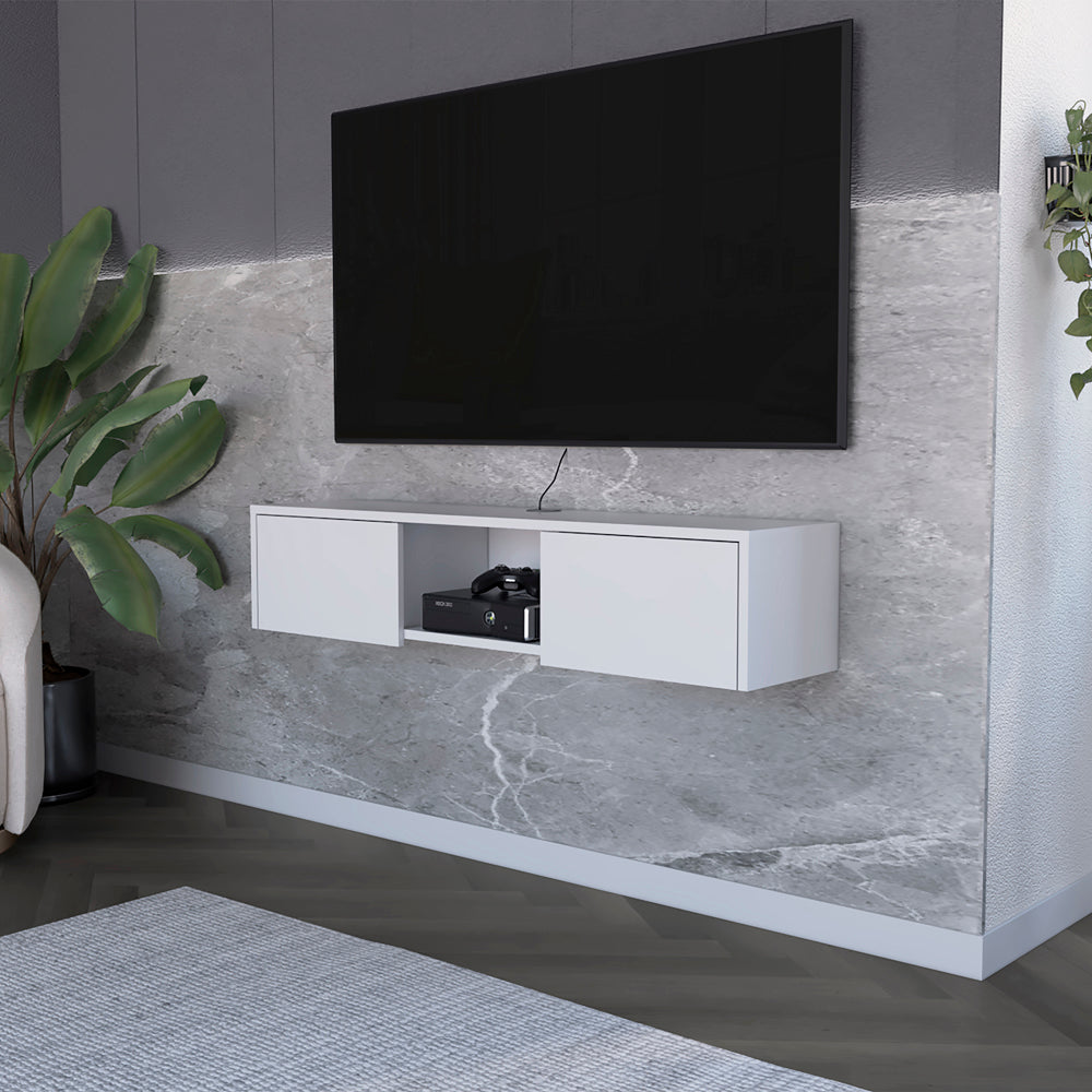 White wallmounted TV stand with open shelf and two drawers holding an Xbox and controller