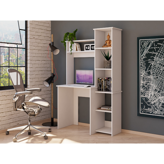 Modern white computer desk with integrated shelving and a laptop for home office setup