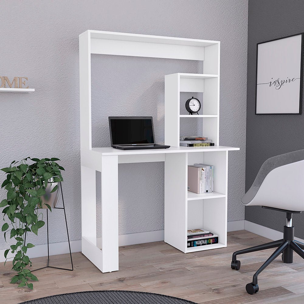 Modern white computer desk with integrated shelving and a laptop