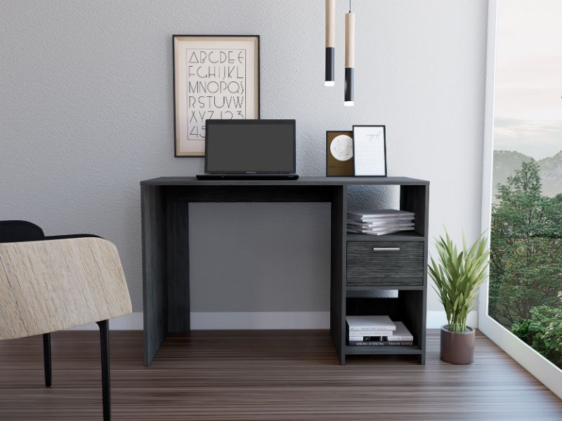 Dark grey modern computer desk with laptop open shelving and a drawer for home office