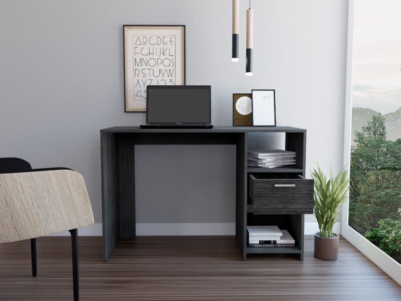 Modern dark gray computer desk with open shelving and a drawer for home office setup
