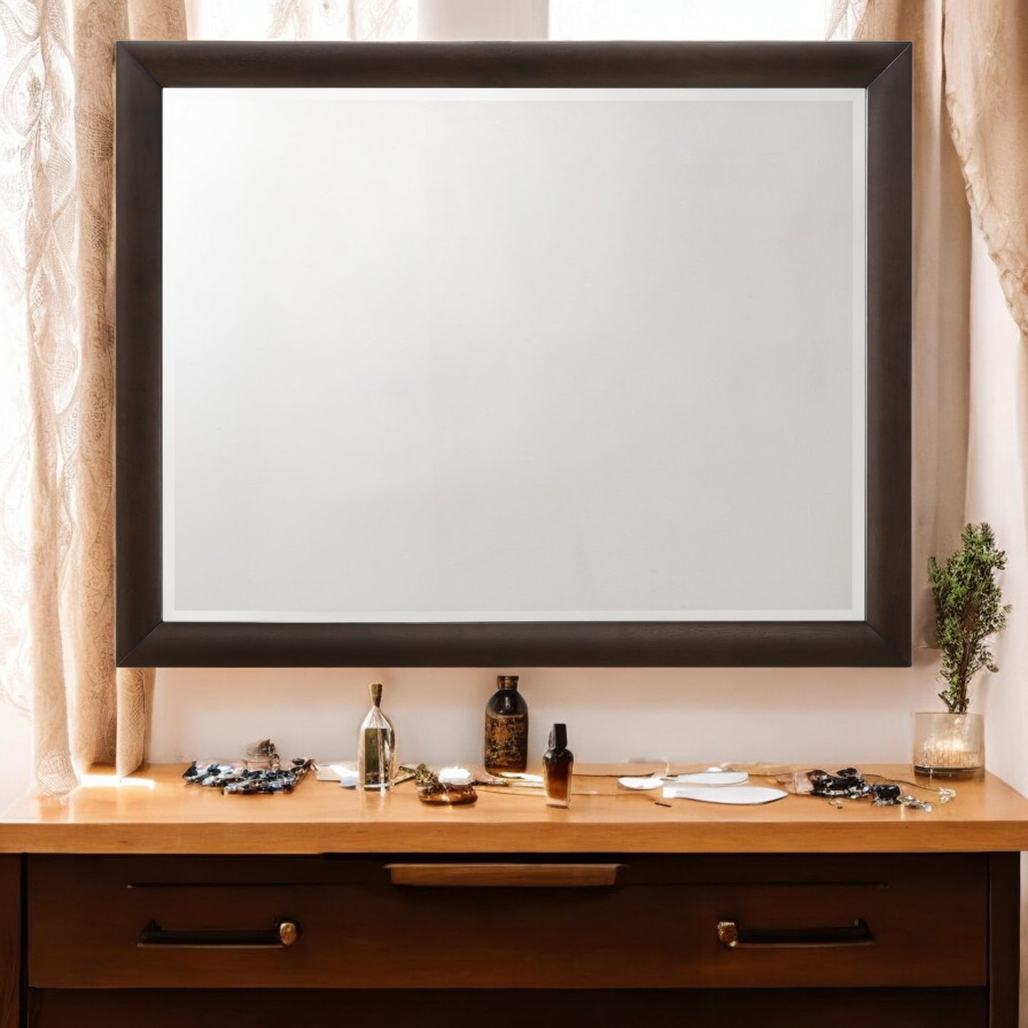 Dark wood framed vanity mirror with bevelled glass
