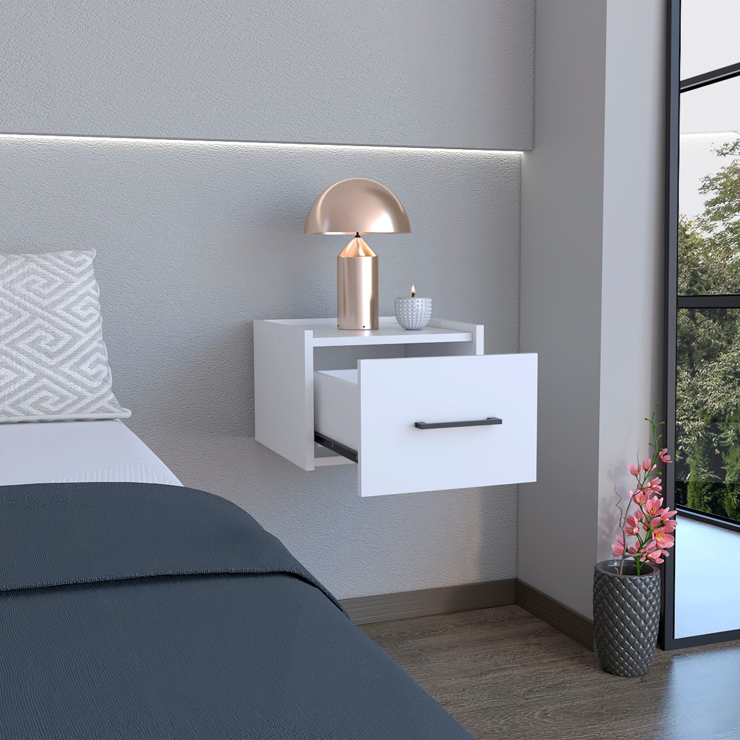 White wallmounted nightstand with an open drawer featuring a black handle