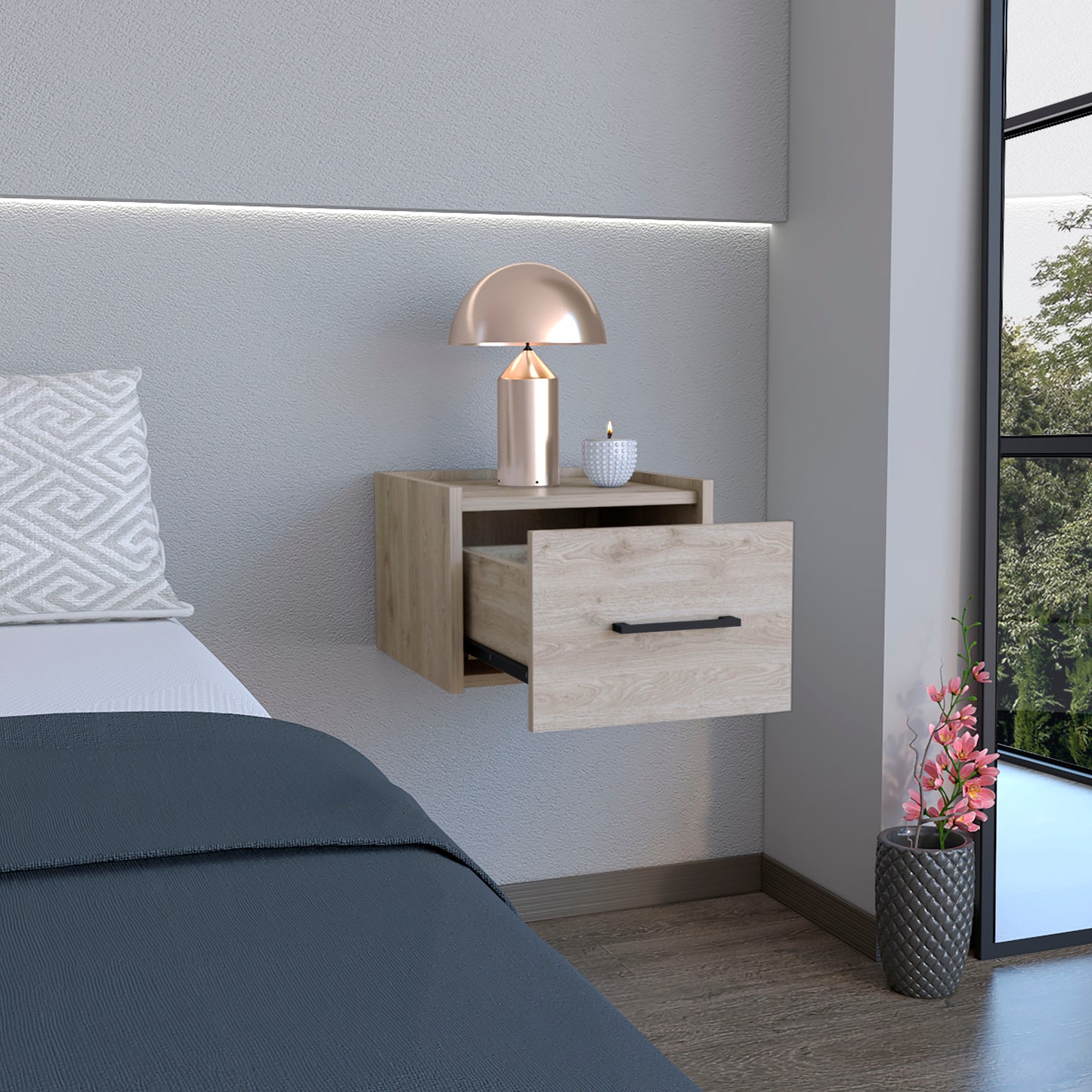 Light oak floating nightstand with open drawer and black handle