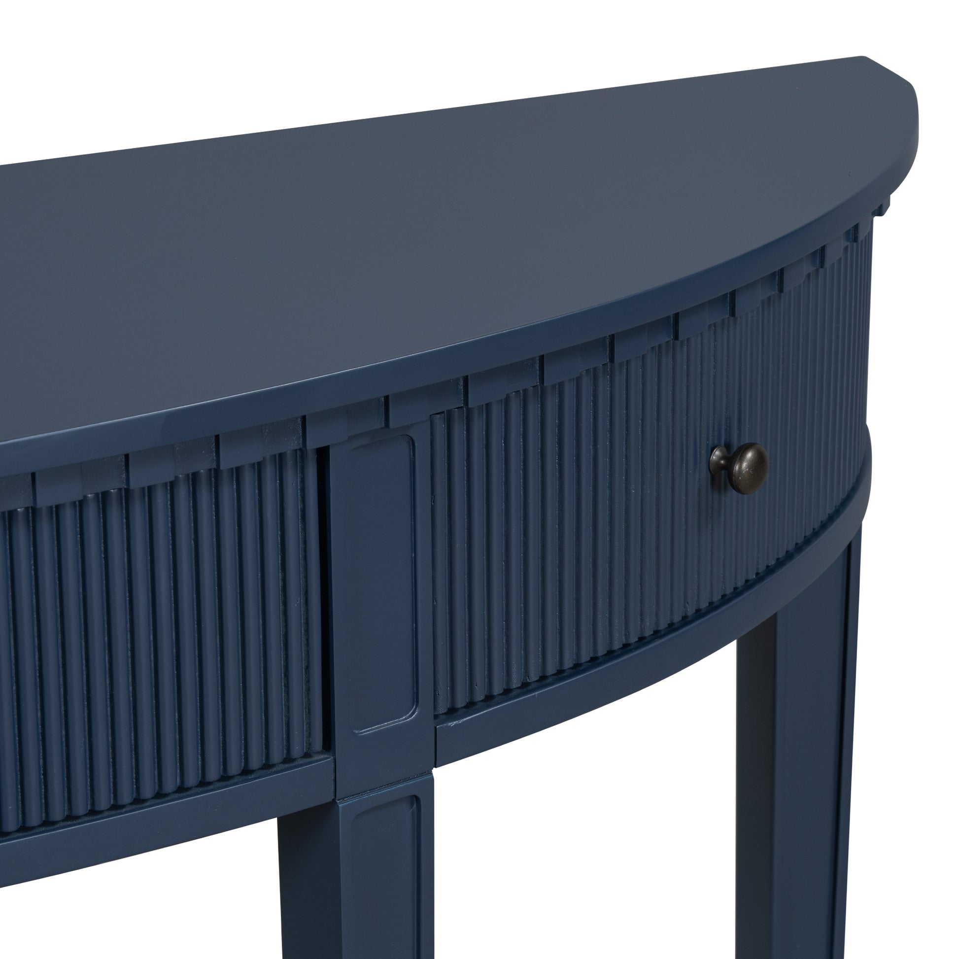Navy blue halfmoon console table with fluted drawer detail and a round dark knob