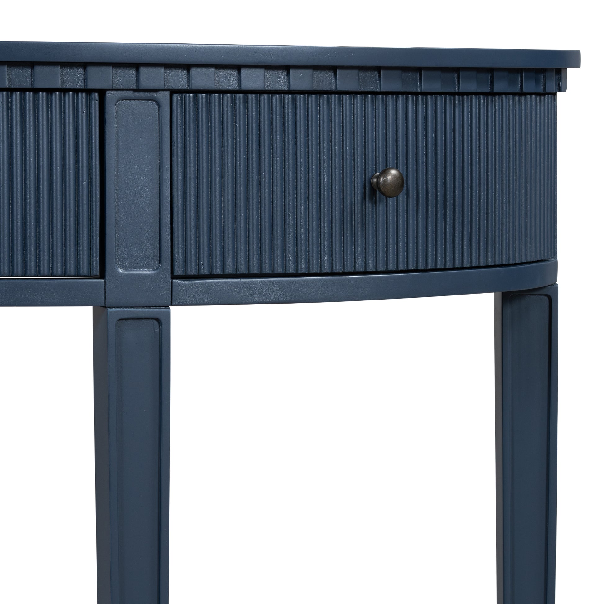 Dark blue wooden console table with fluted drawer front and antique brass knob