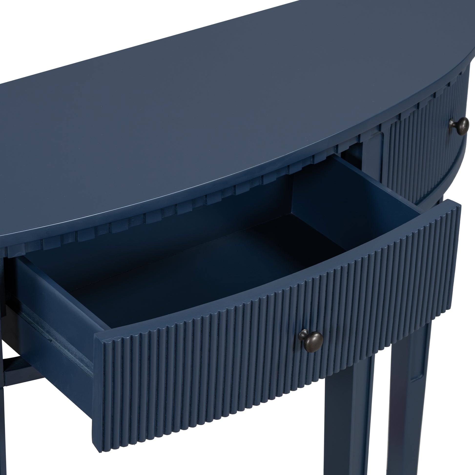 Dark blue halfmoon console table with fluted drawer front and exposed interior