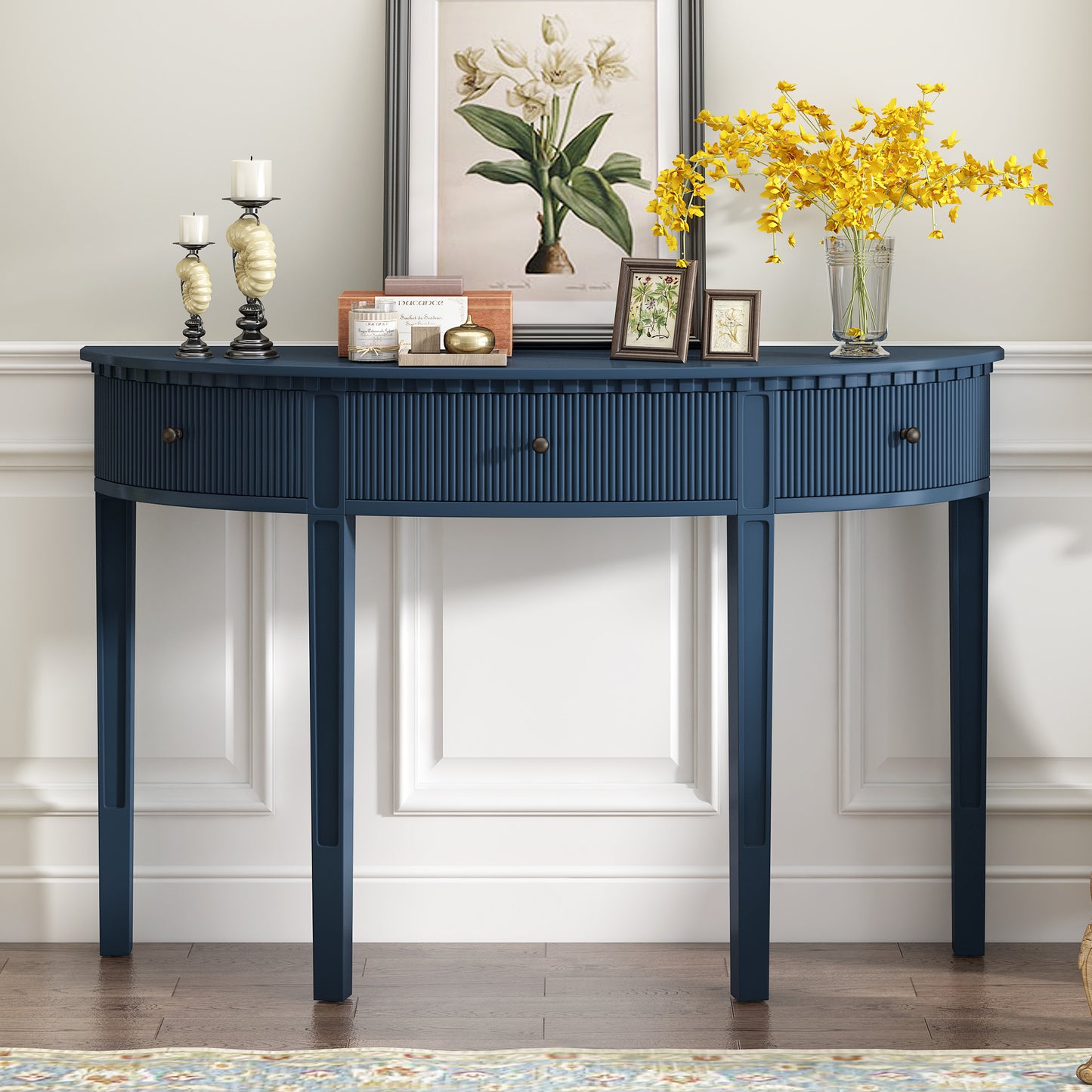 Navy blue fluted halfmoon console table with antique brass knobs