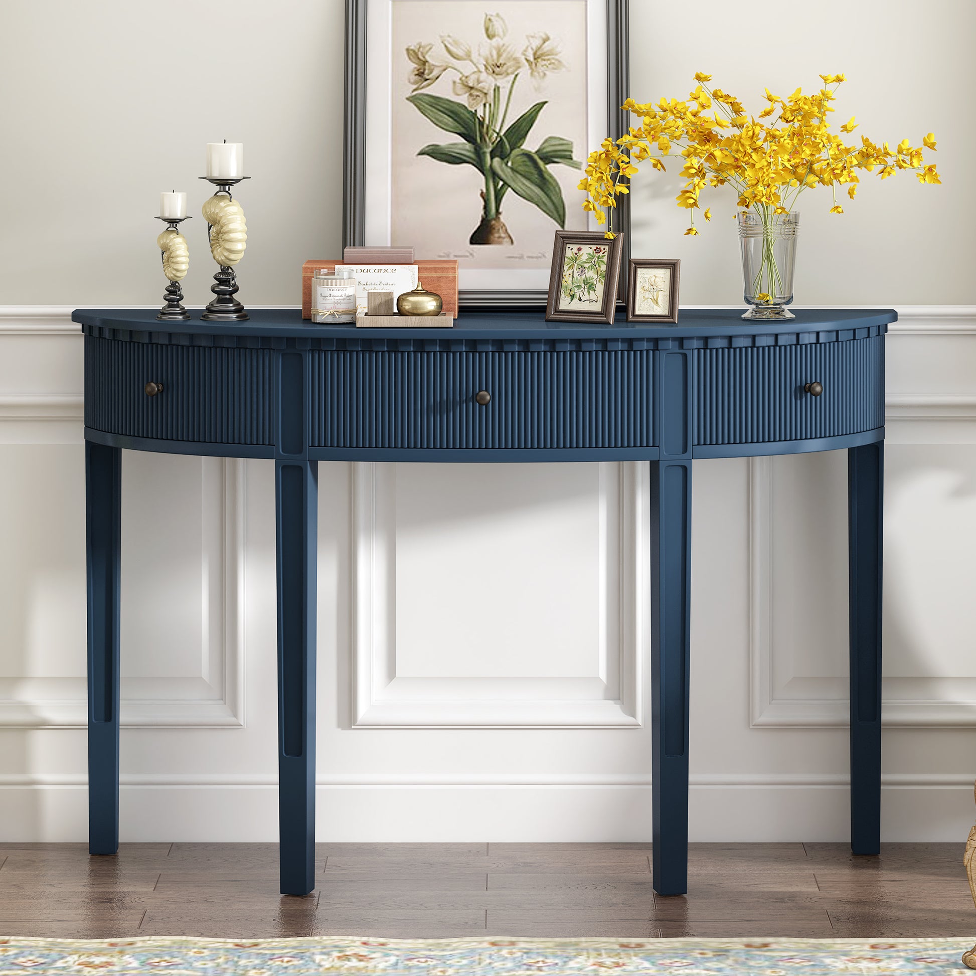 Navy blue fluted halfmoon console table with antique brass knobs