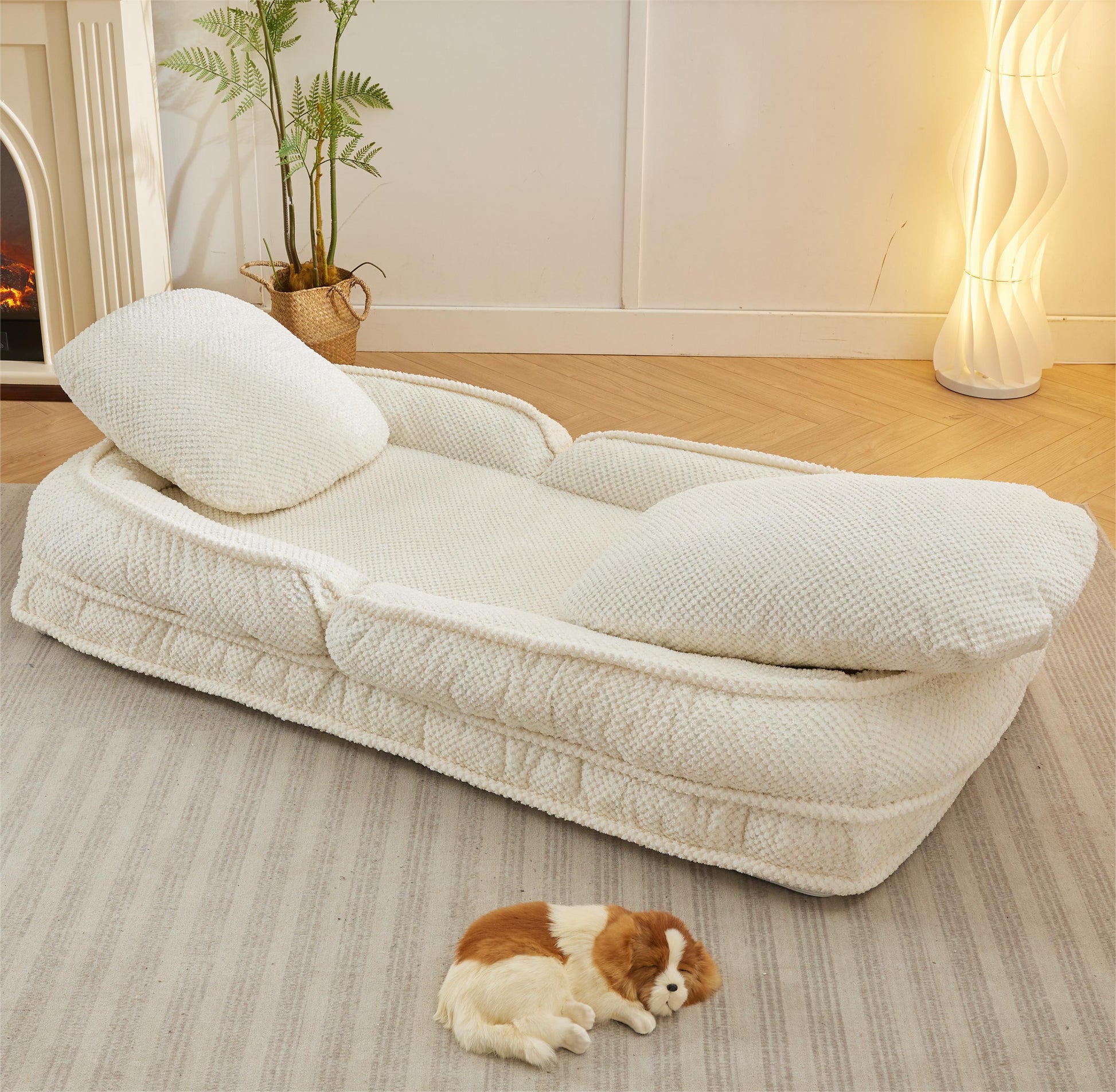 Plush white dog sofa with bolster sides and removable cushions perfect for small pets