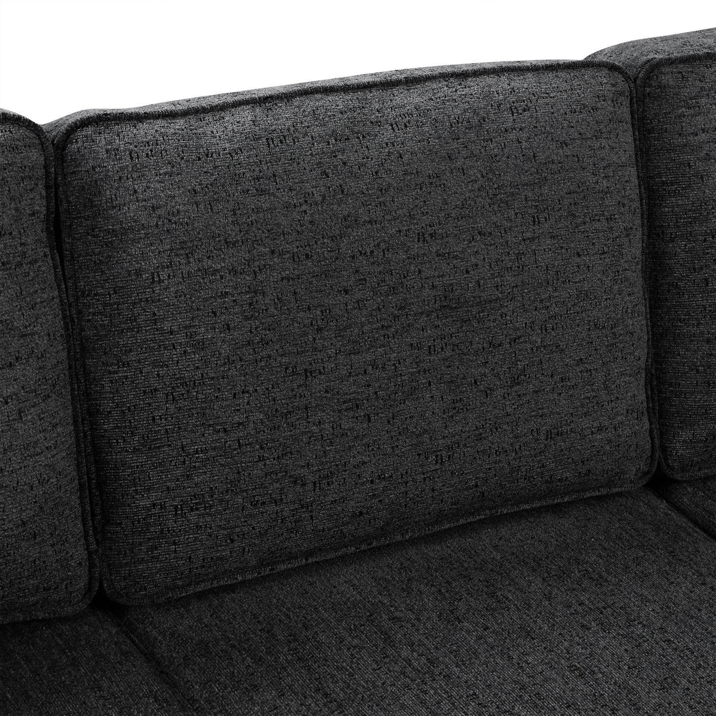 Closeup of dark grey textured fabric sofa cushions modern living room style