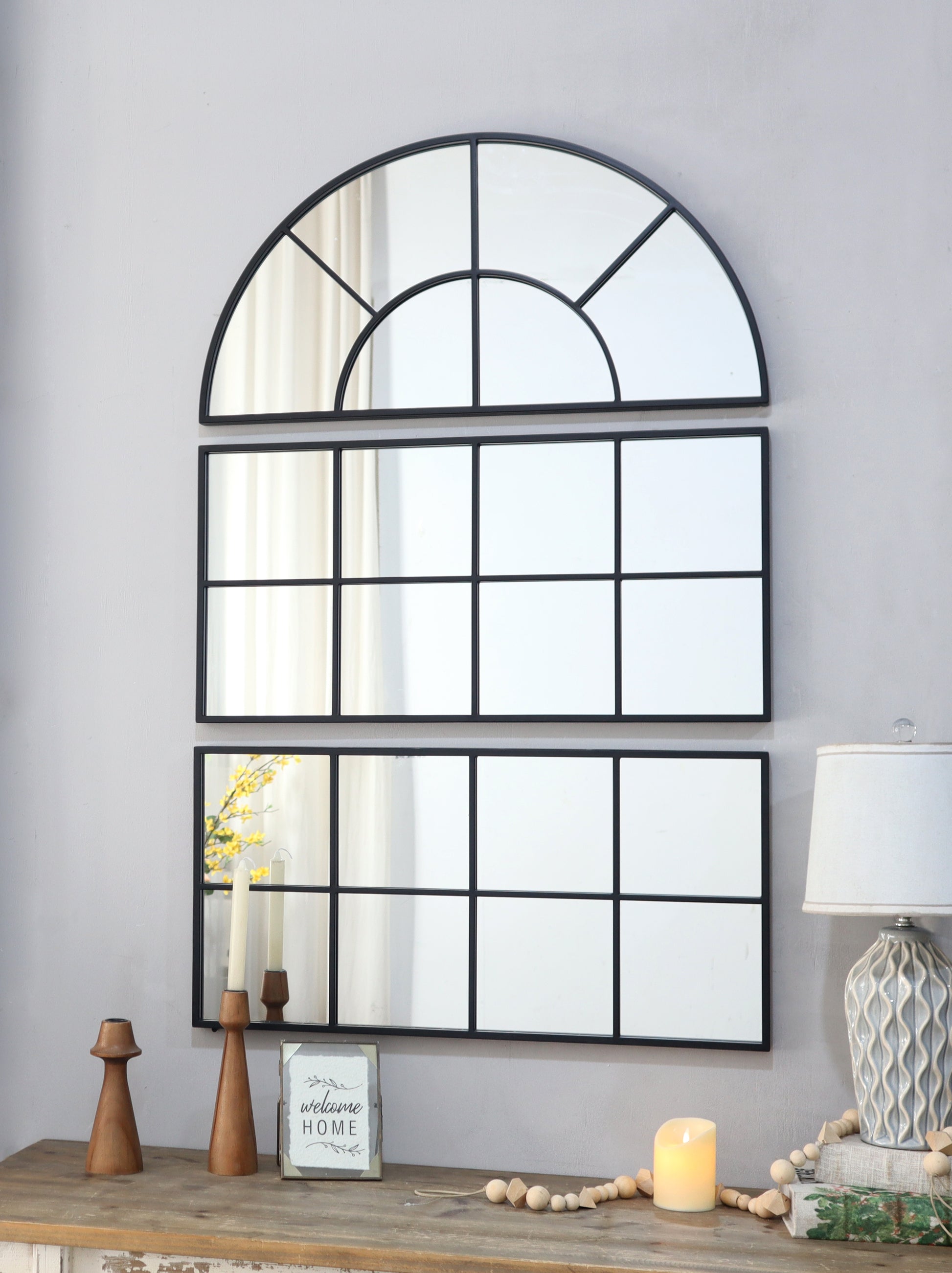 Arched black metal window pane mirror with  segments modern wall decor