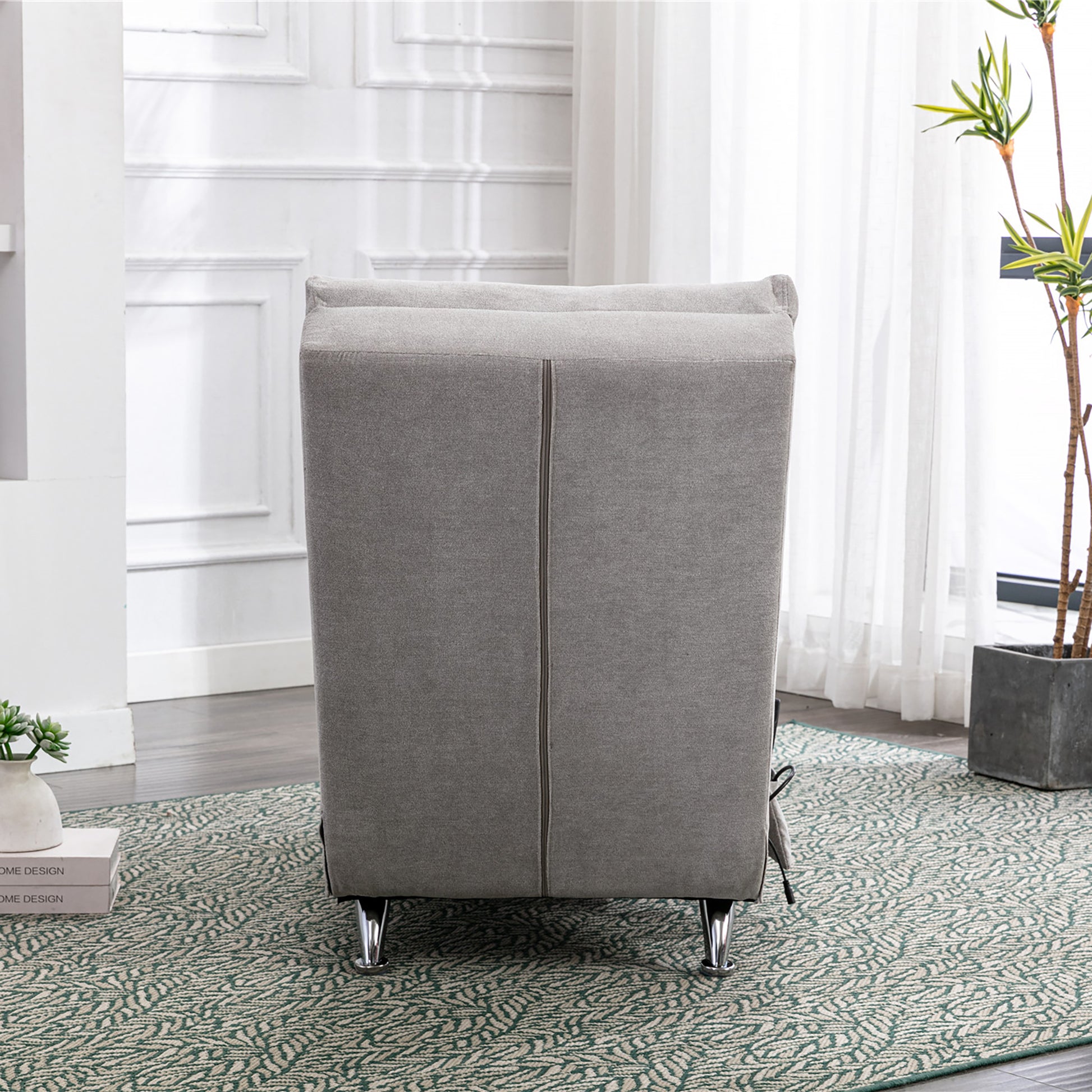 Gray fabric armchair with modern design and chrome legs perfect for living room decor