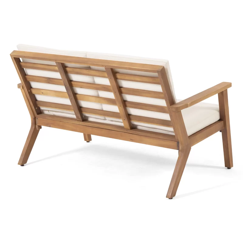 Wooden outdoor loveseat with cream cushions and slatted backrest