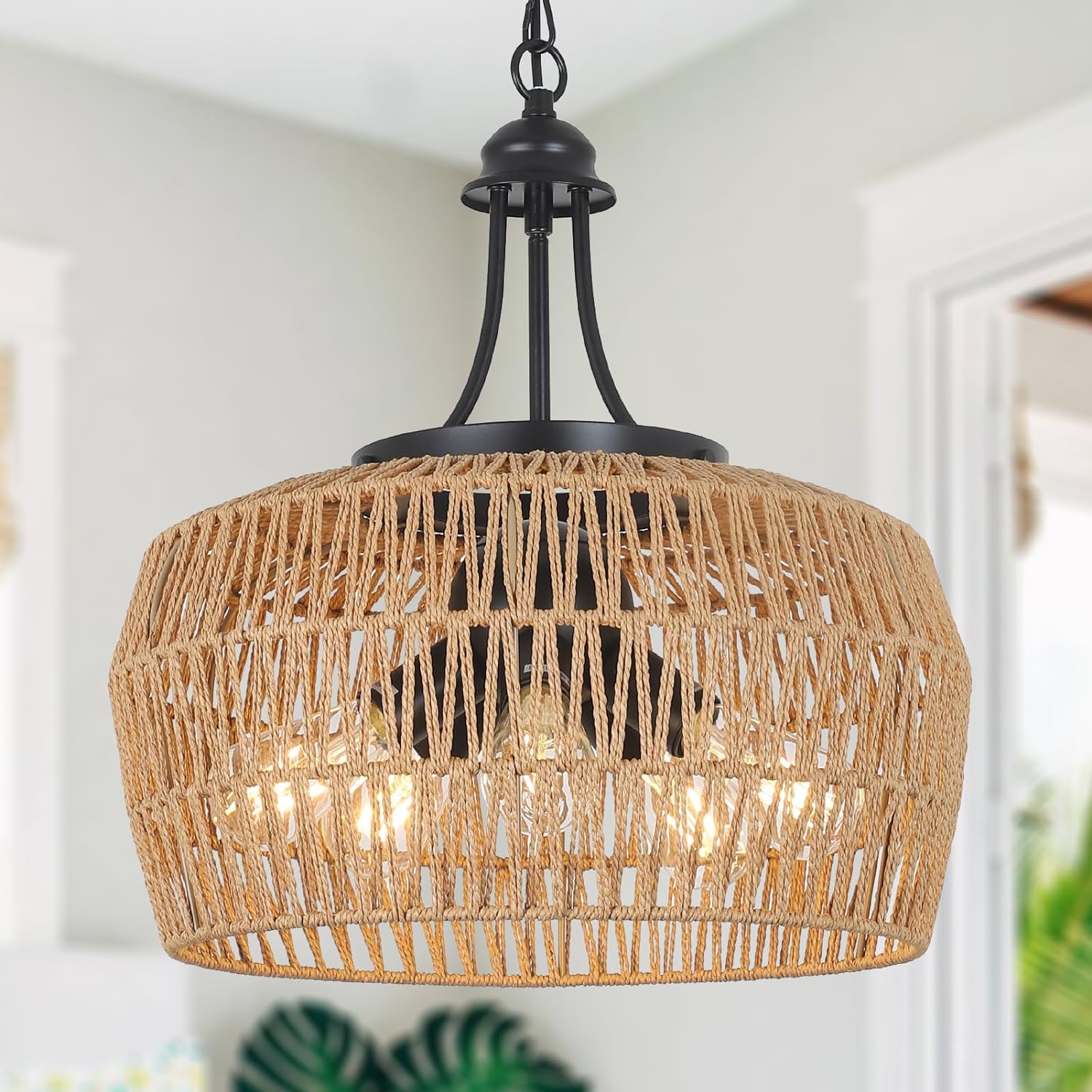Rustic pendant light with natural jute shade and black metal accents ideal for bohemian decor