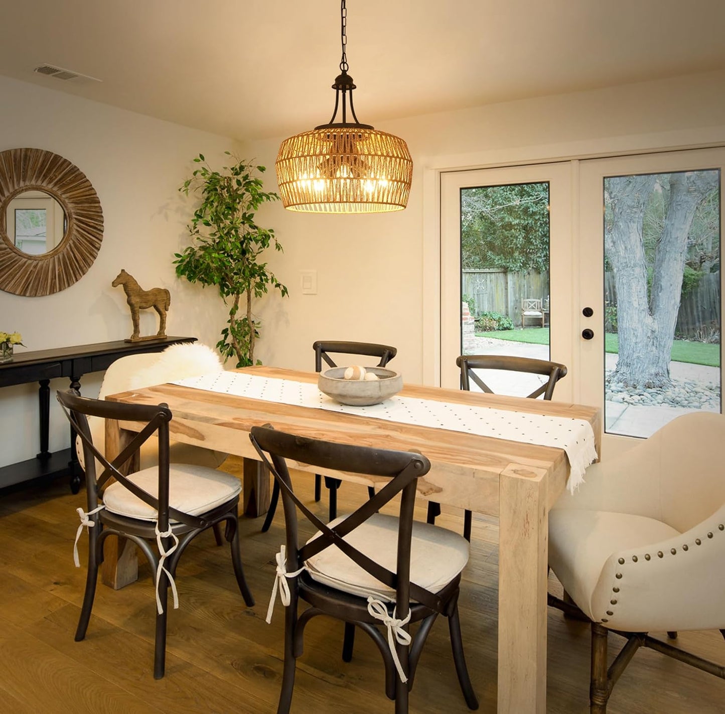 Natural woven pendant light with rattan shade casting warm ambient light in dining room