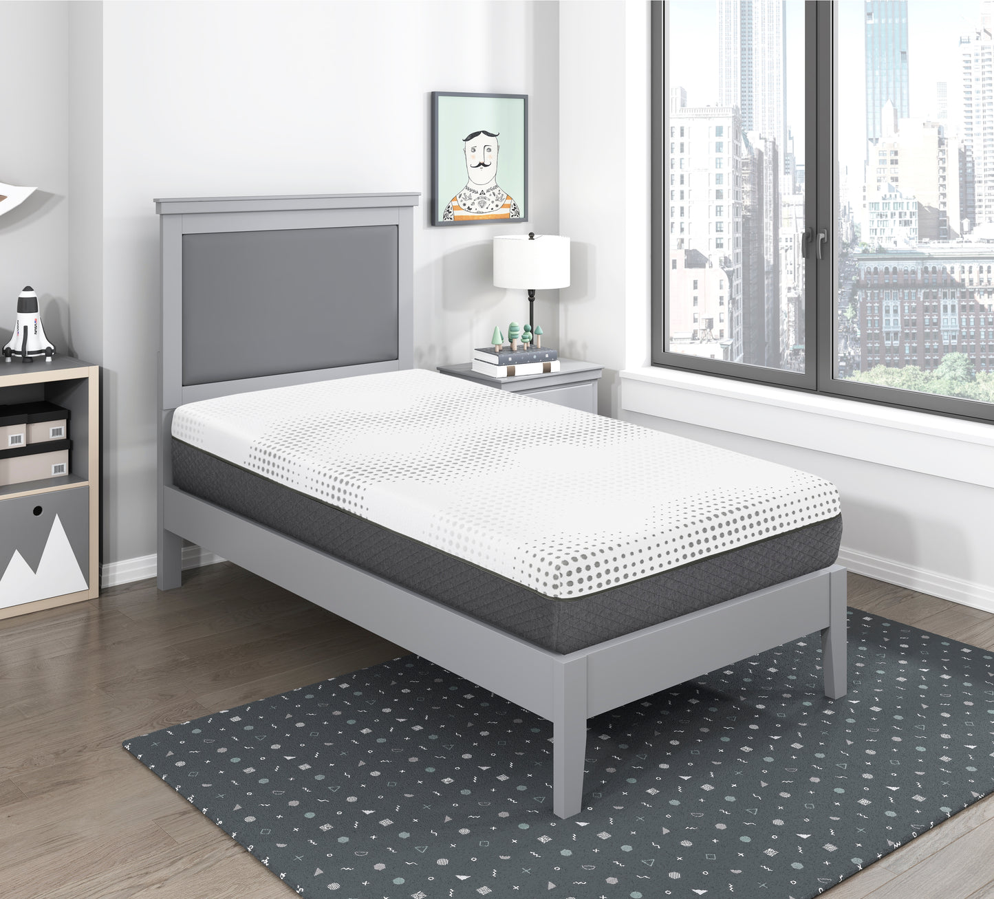White and gray gel memory foam mattress with polka dot pattern on a gray bed frame