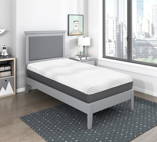White and gray gel memory foam mattress with polka dot pattern on a gray bed frame