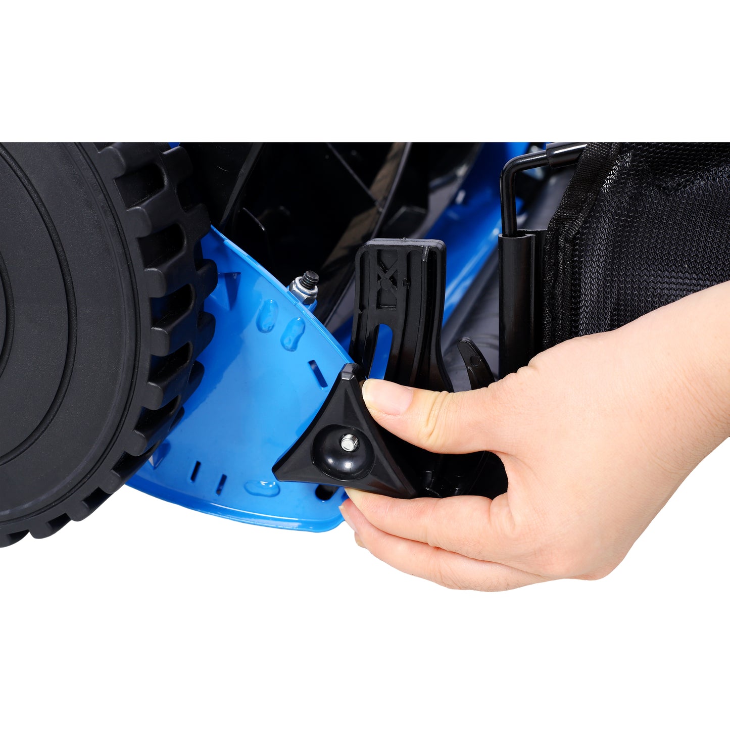 Closeup of a blue lawn mower assembly showing a hand adjusting a black plastic component near the wheel