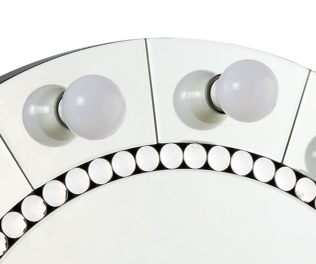 Closeup of vanity mirror with integrated LED bulbs and crystal accents