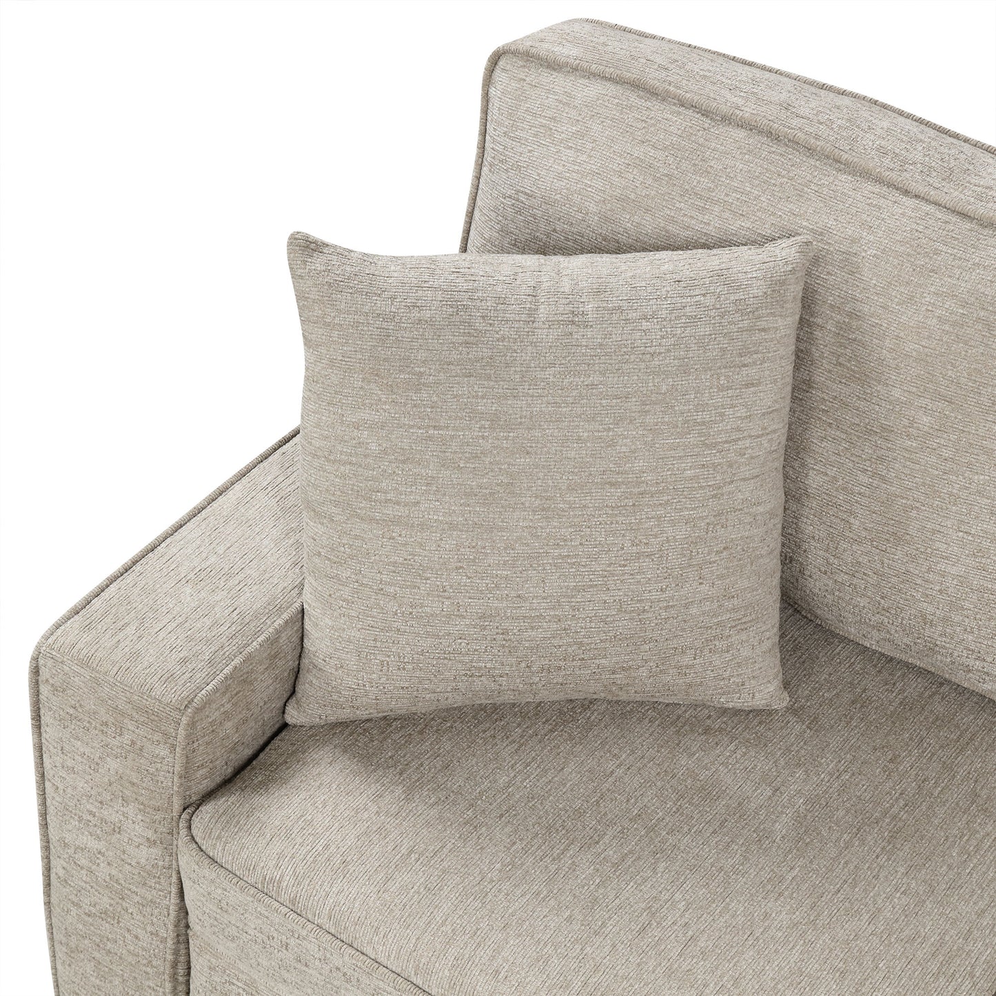 Closeup of a textured beige throw pillow on a matching sofa