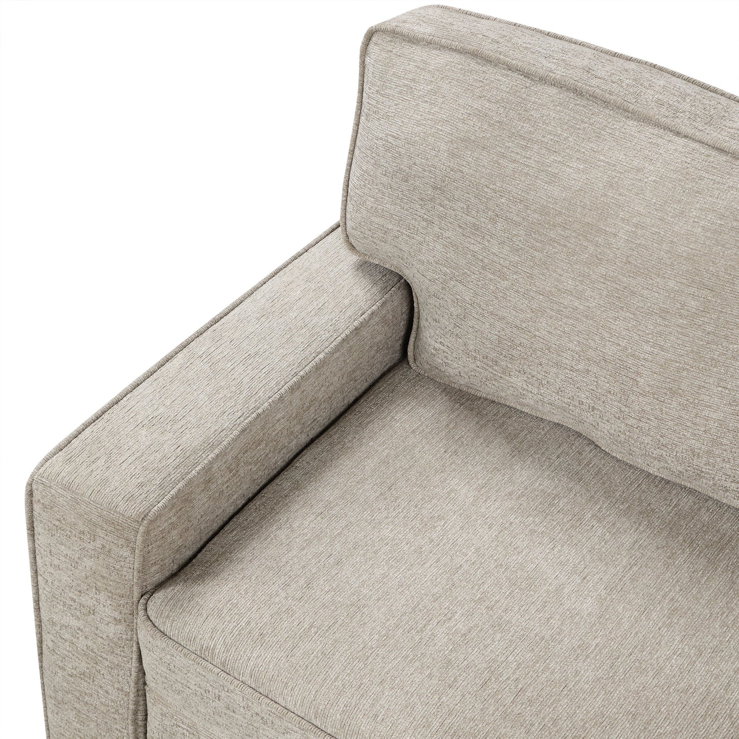 Closeup of a modern beige fabric armchair armrest and seat cushion