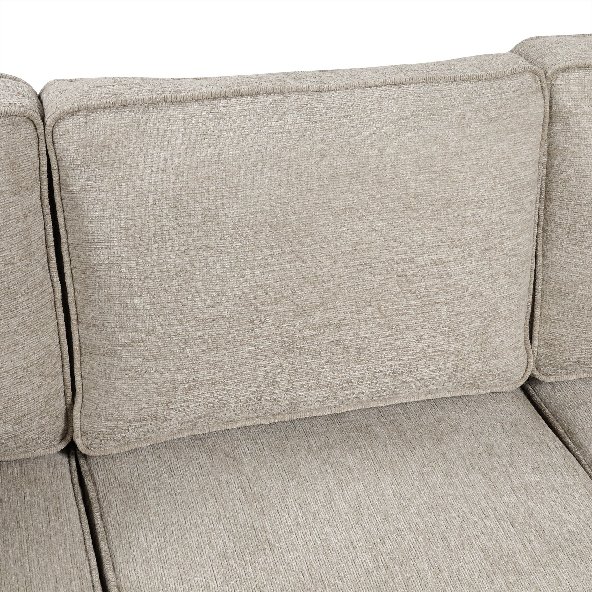 Beige textured fabric sofa back cushion with piped edges