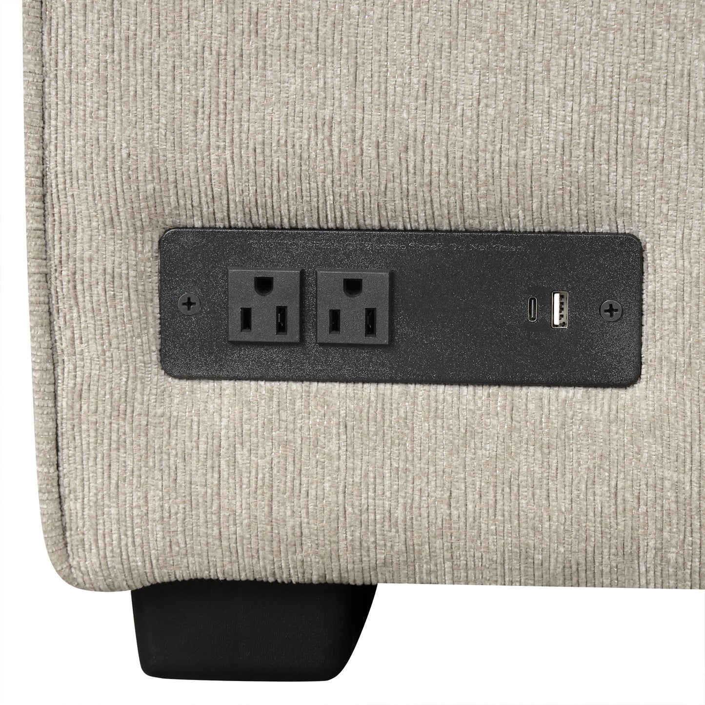Textured beige recliner armrest with builtin power outlet and USB ports