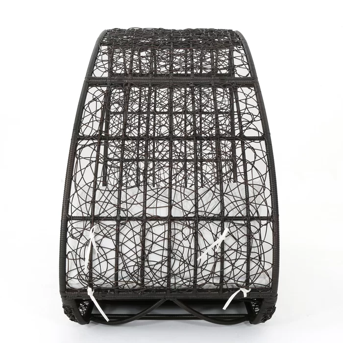 Woven dark brown rattan egg chair with white cushion ties perfect for patio seating