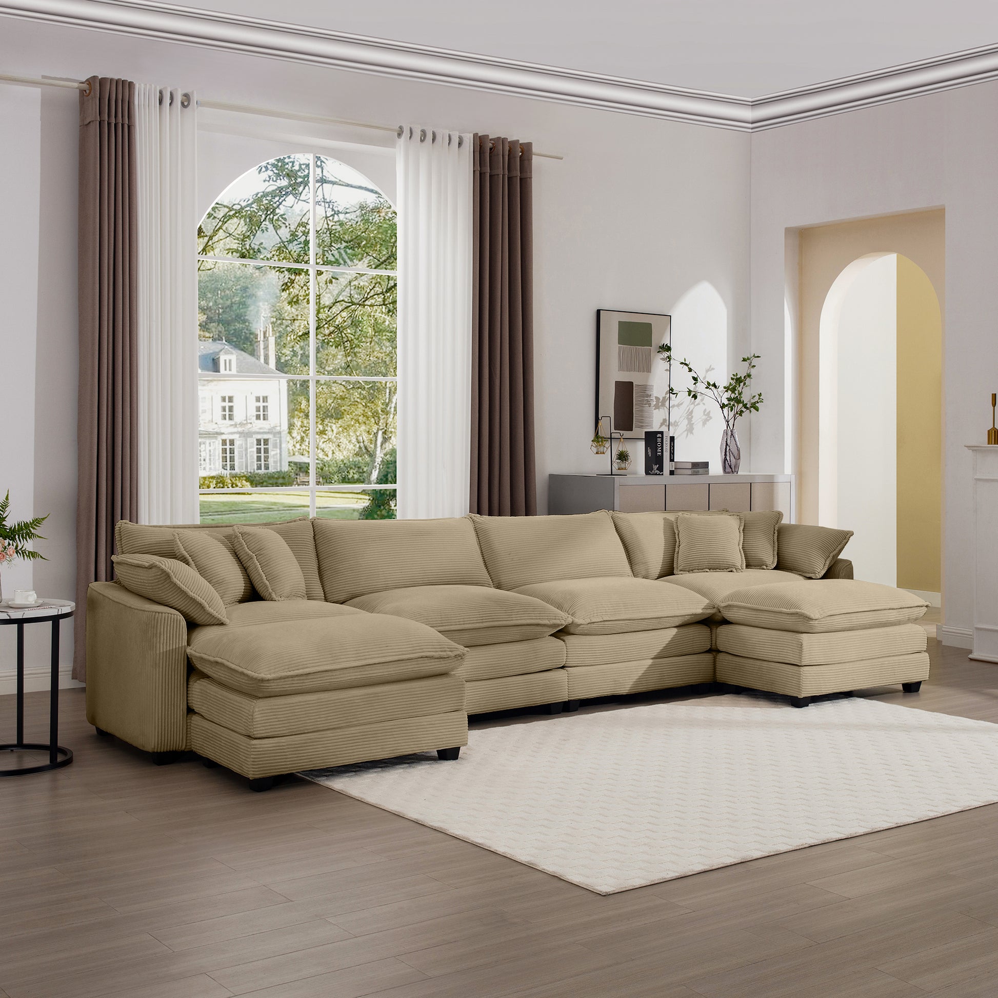 Beige corduroy sectional sofa with plush cushions and a chaise lounge