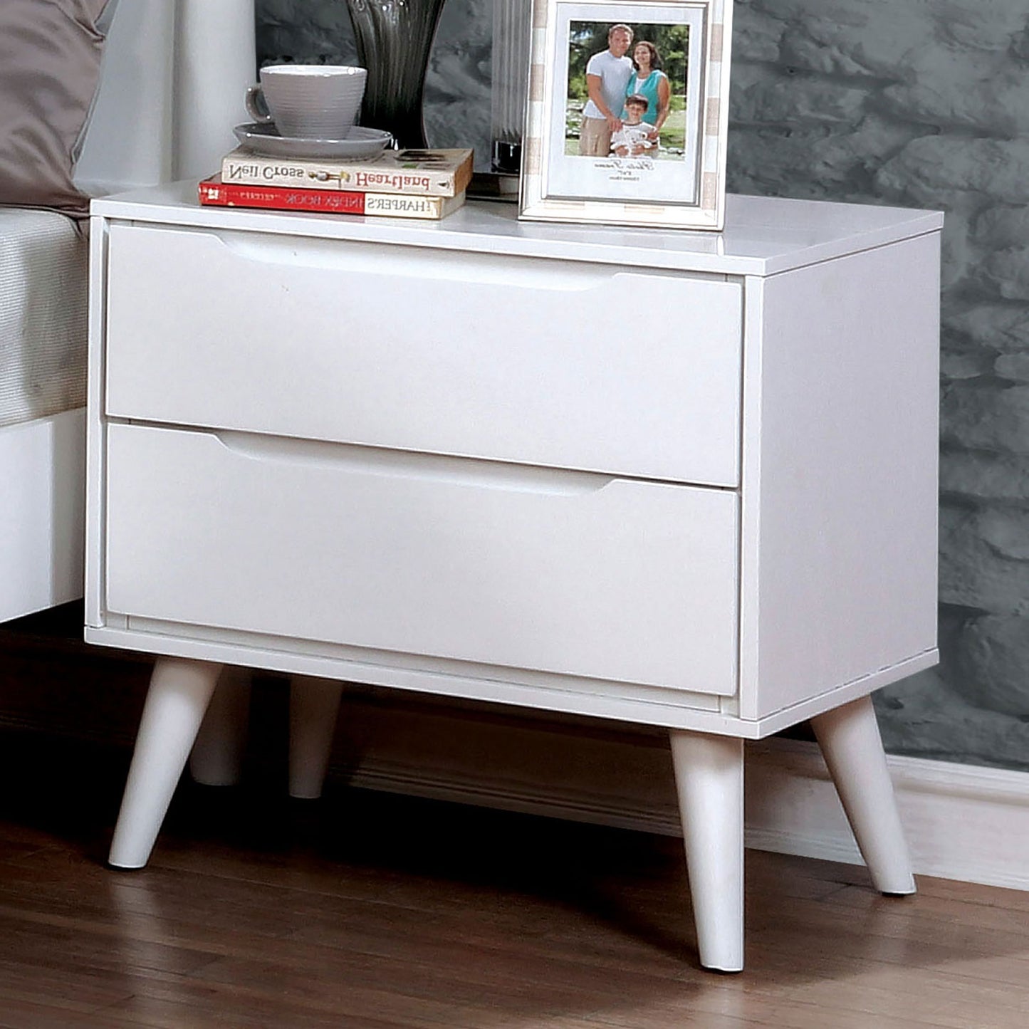 White twodrawer nightstand with tapered legs midcentury modern design