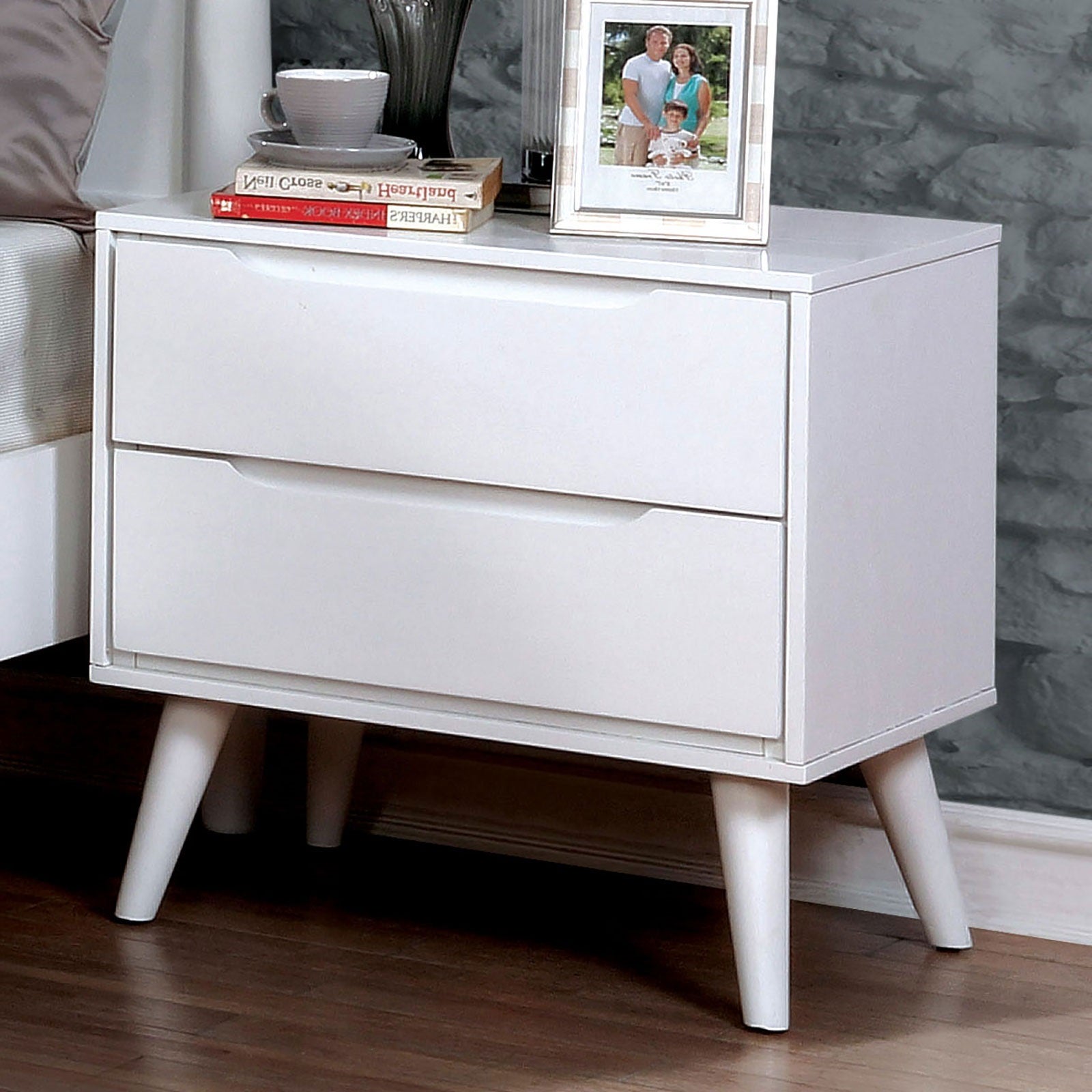 White twodrawer nightstand with tapered legs midcentury modern design
