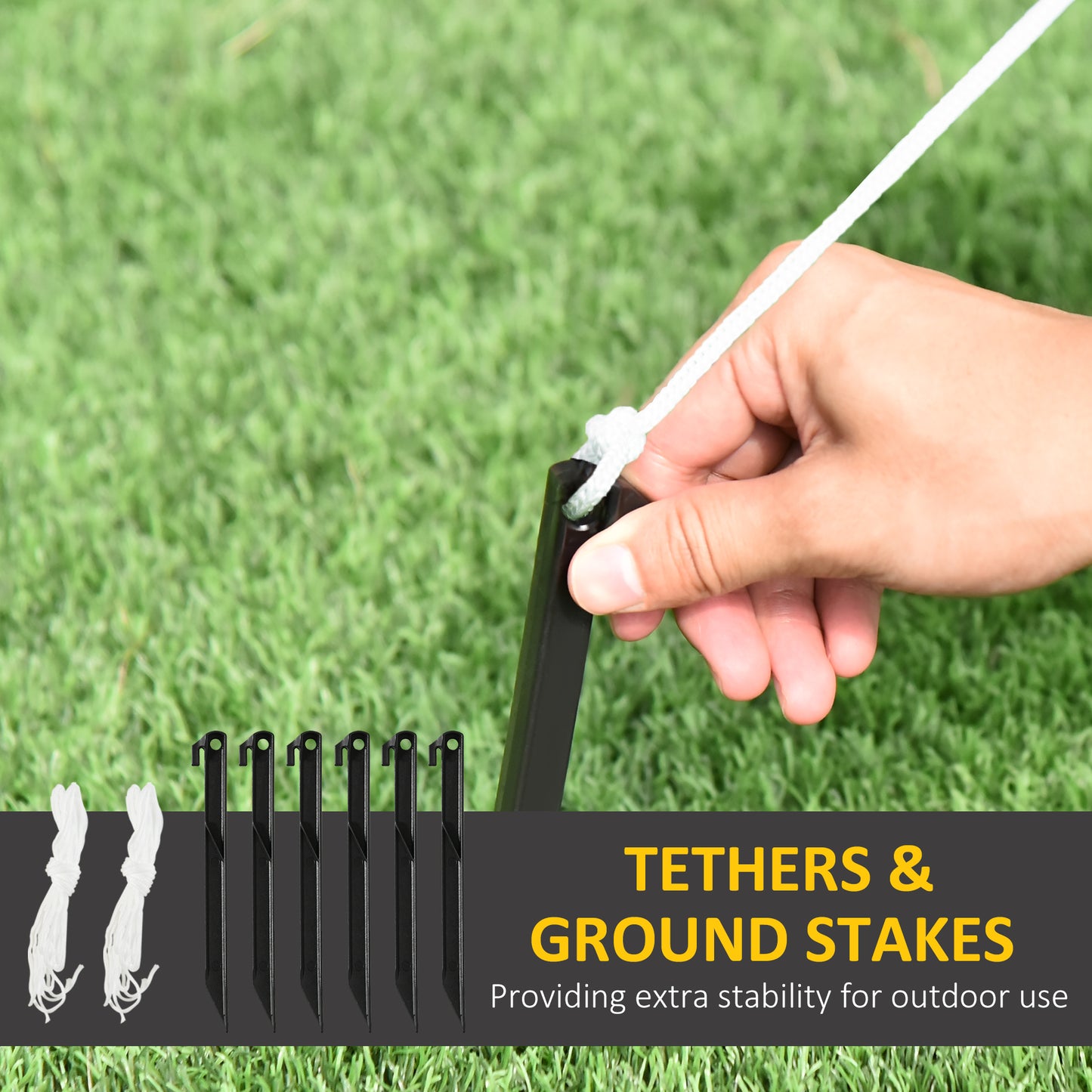 Black plastic ground stakes with white tether ropes for outdoor stability