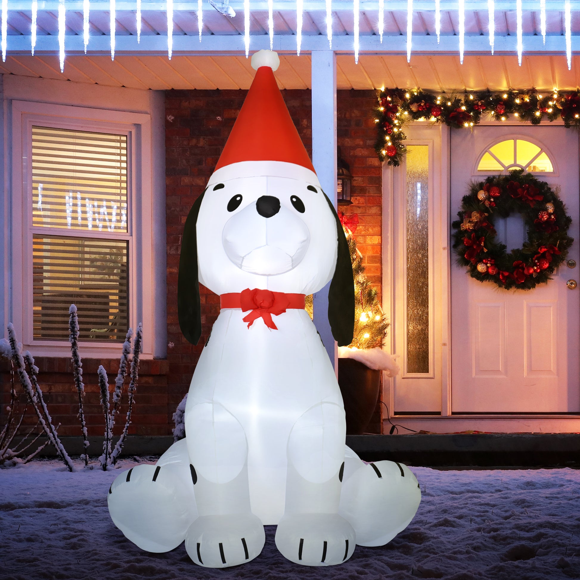 Inflatable white dog wearing Santa hat and red bow tie a perfect holiday yard decoration