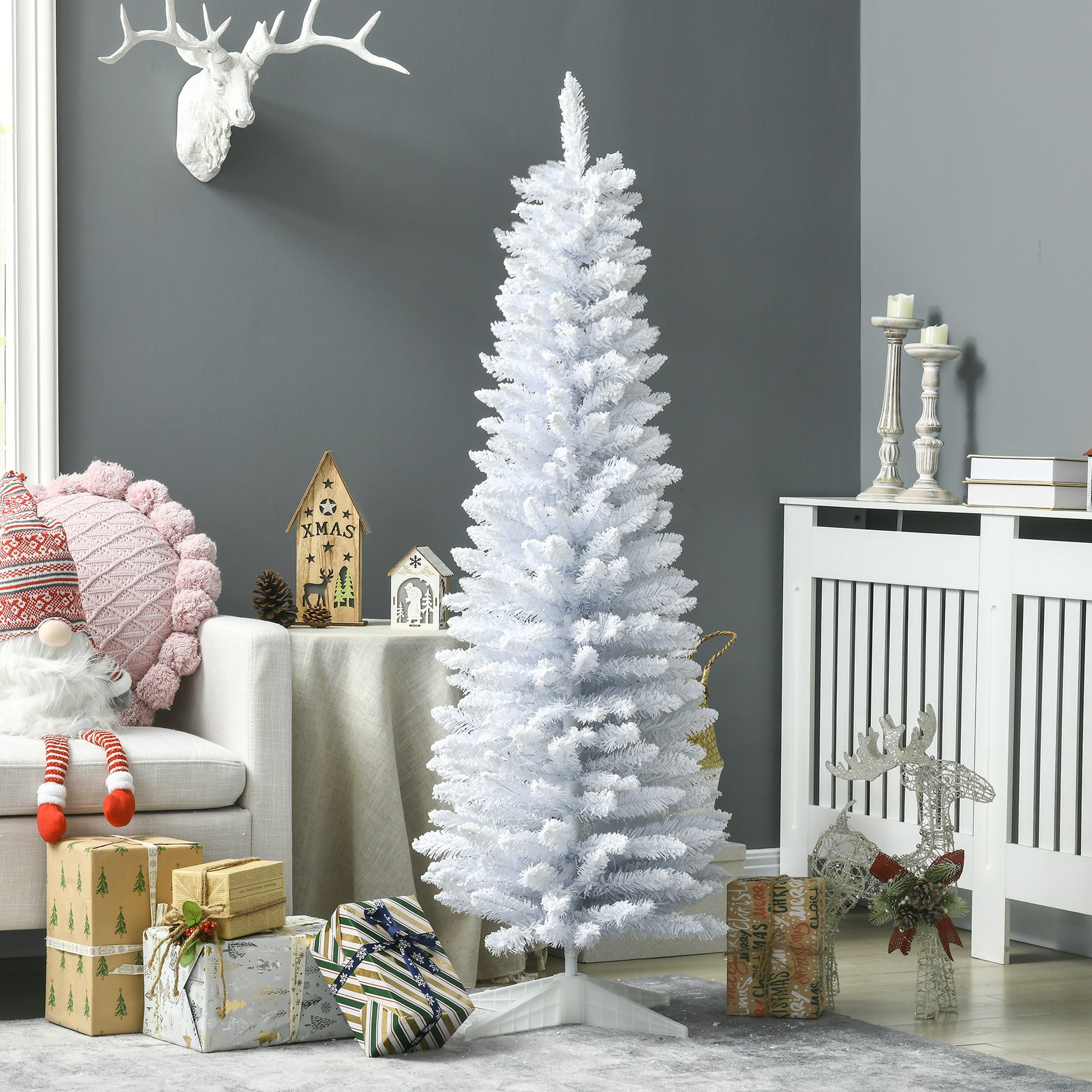 Tall white artificial Christmas tree with a slim profile ideal for small spaces