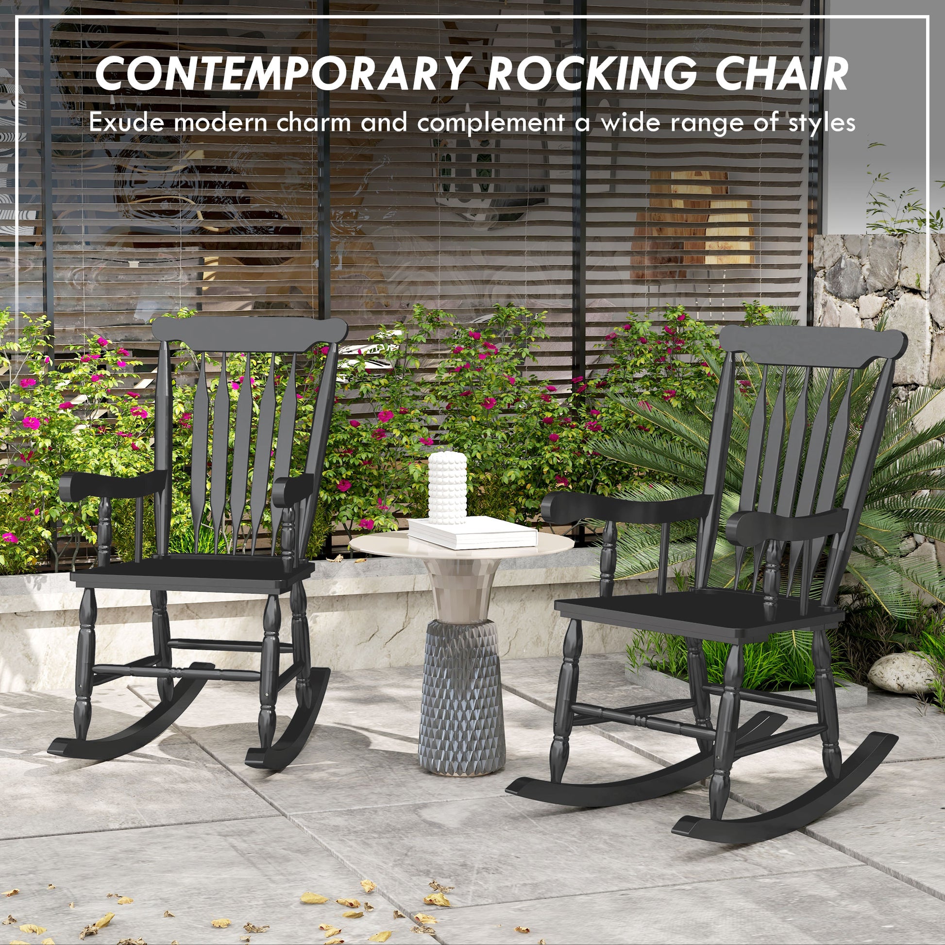Classic black wooden rocking chair with spindle back and curved legs