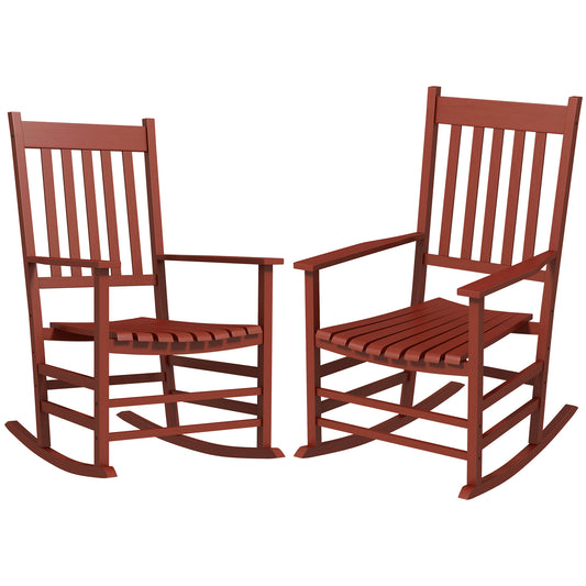 Two classic red wooden rocking chairs sidebyside on a white background