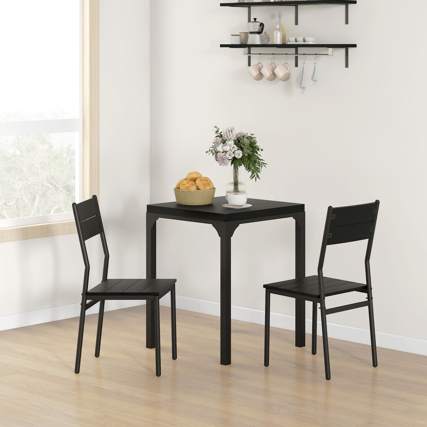 Set of two modern black metal dining chairs with slatted backs and seats