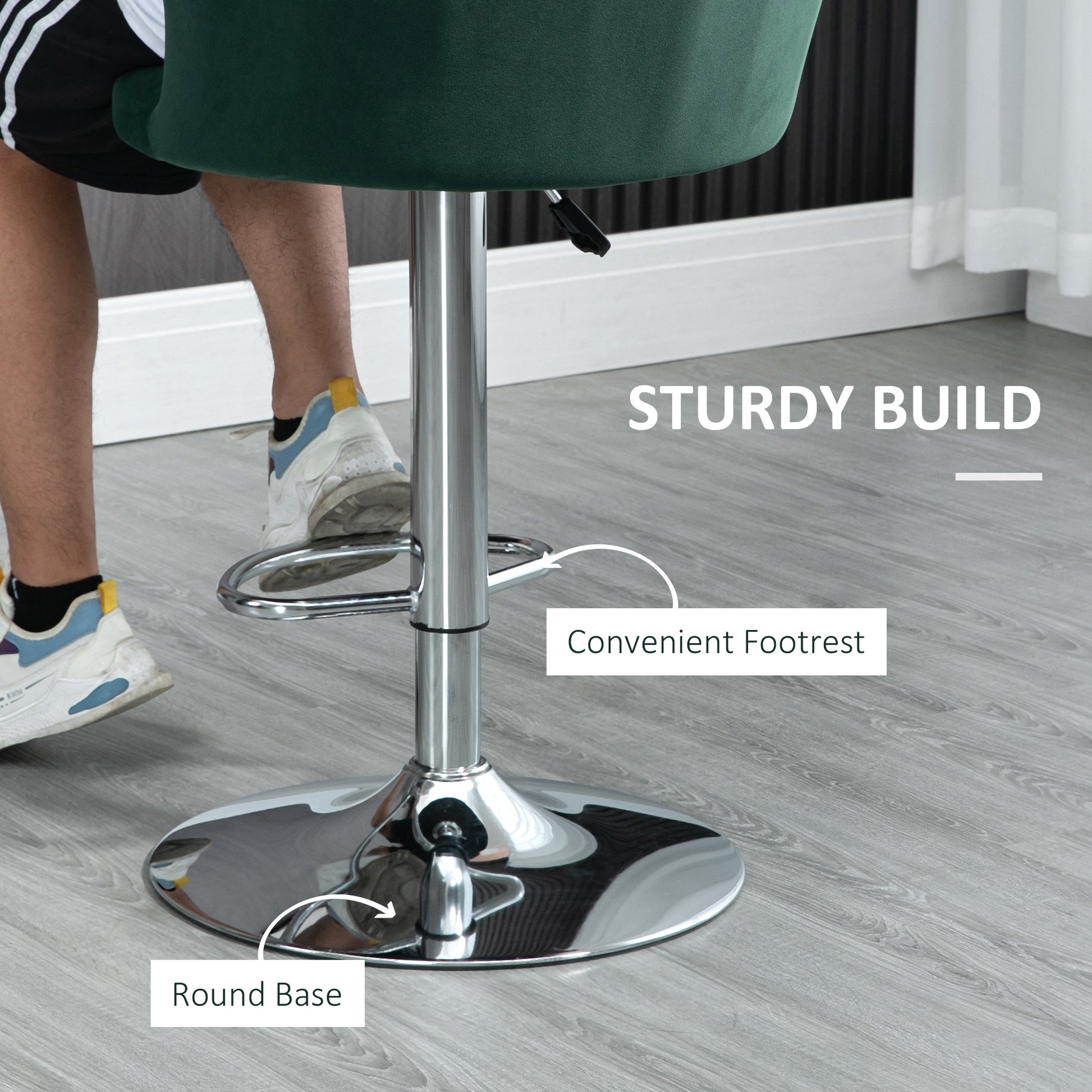 Dark green velvet bar stool with a polished chrome adjustable gas lift and a round base