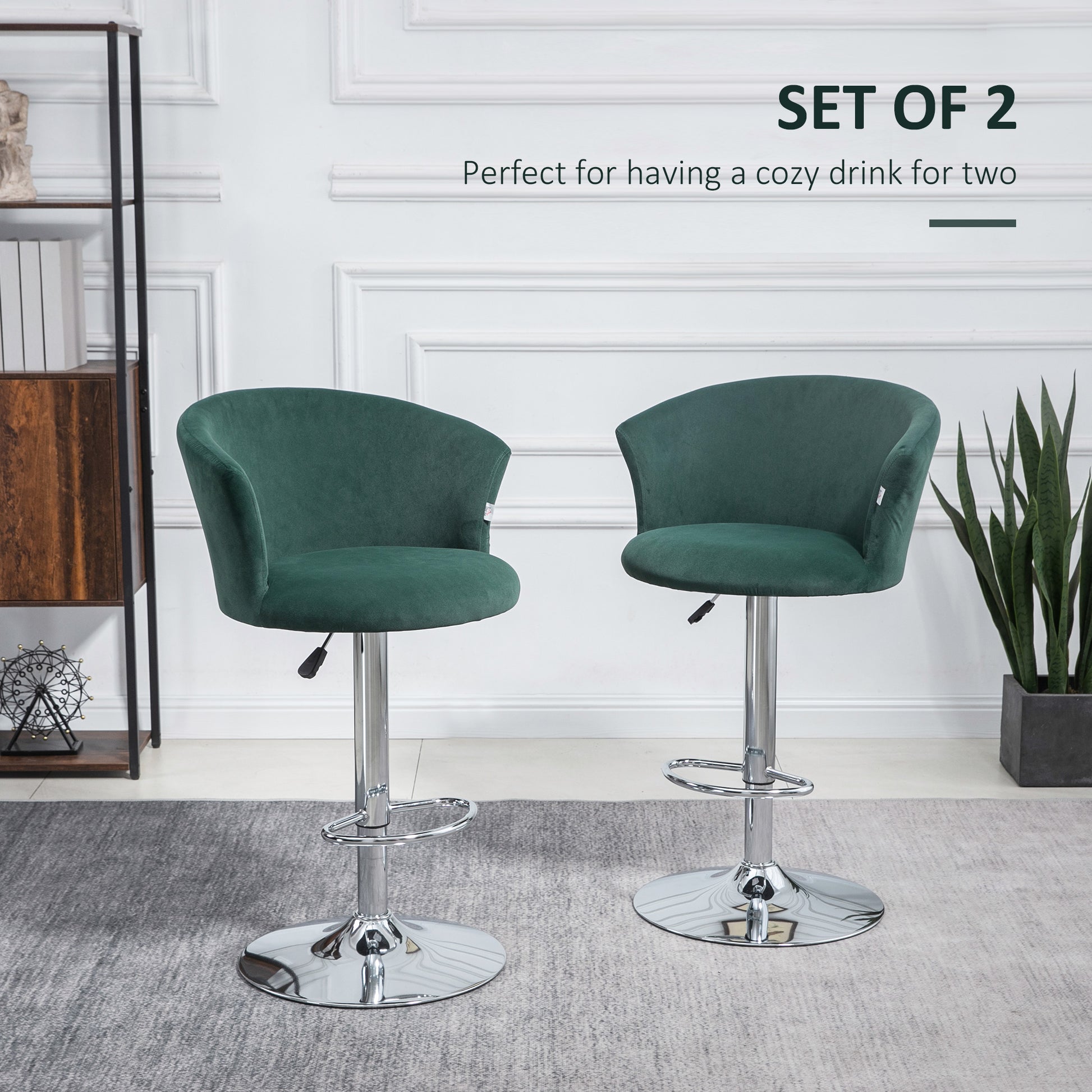Set of two emerald green velvet bar stools with chrome bases