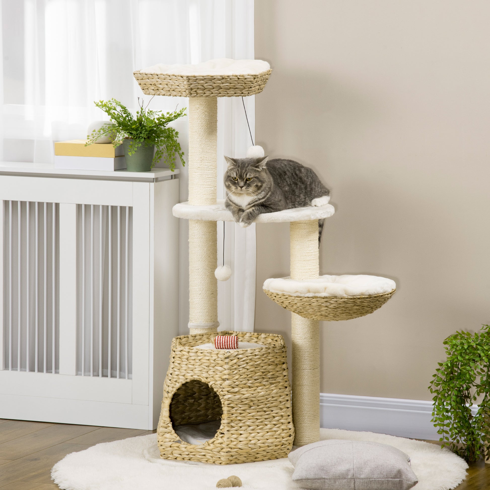 Multilevel cat tree with sisal rope scratching posts and woven baskets