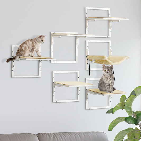 Modern white wallmounted cat shelves with beige pads featuring a tabby cat resting