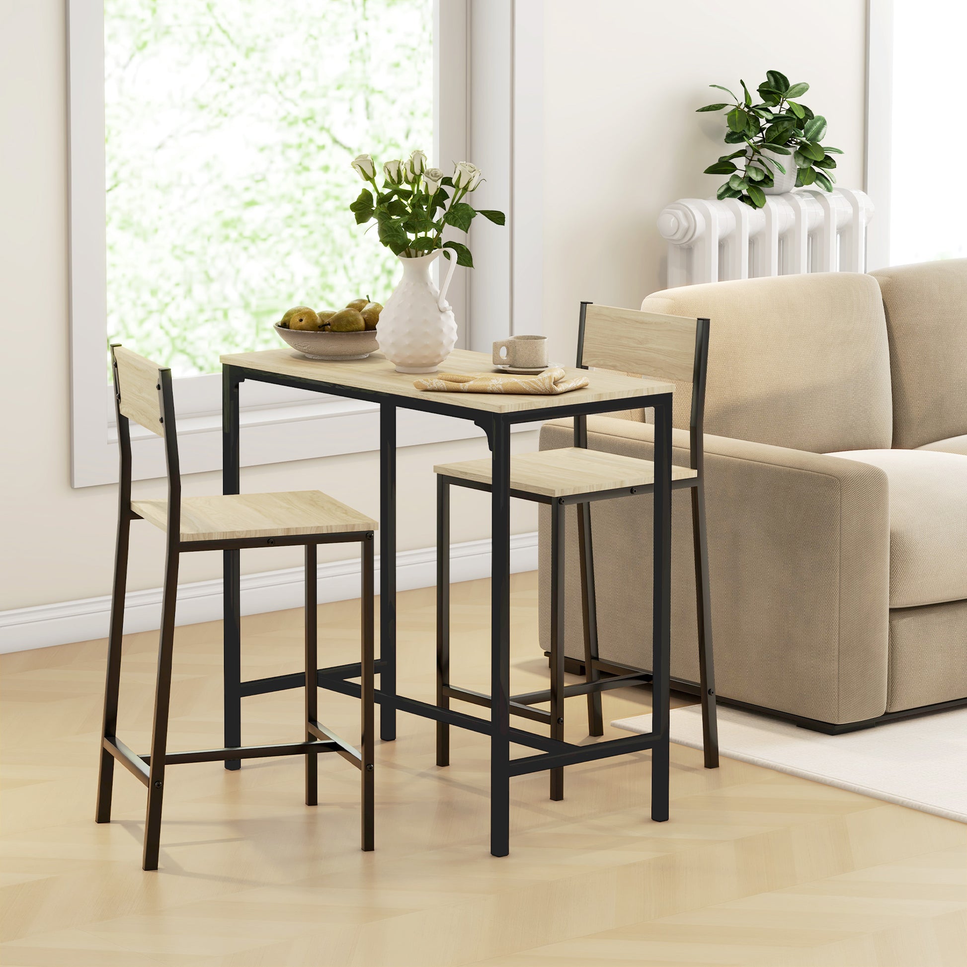 Light wood and black metal bar table with two stools perfect for small spaces