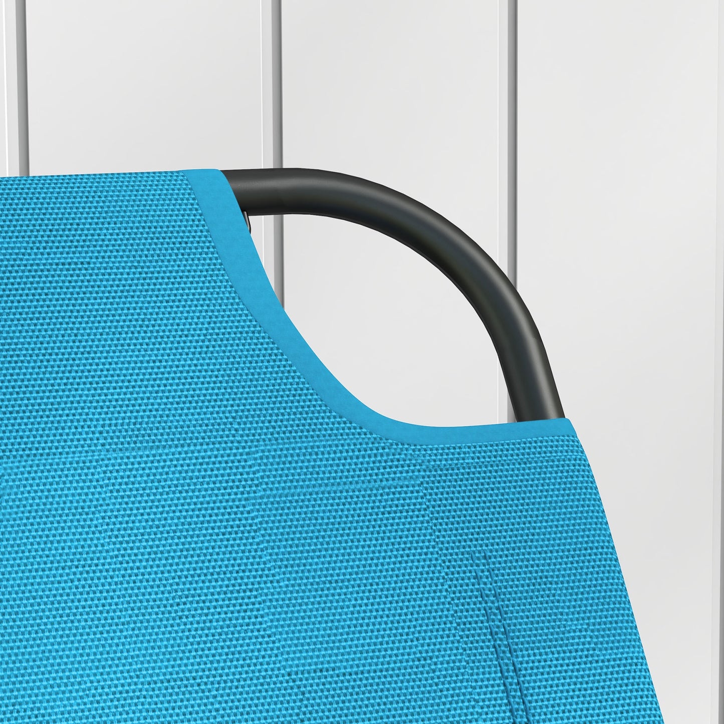 Turquoise mesh fabric on a black metal frame part of a recliner chair