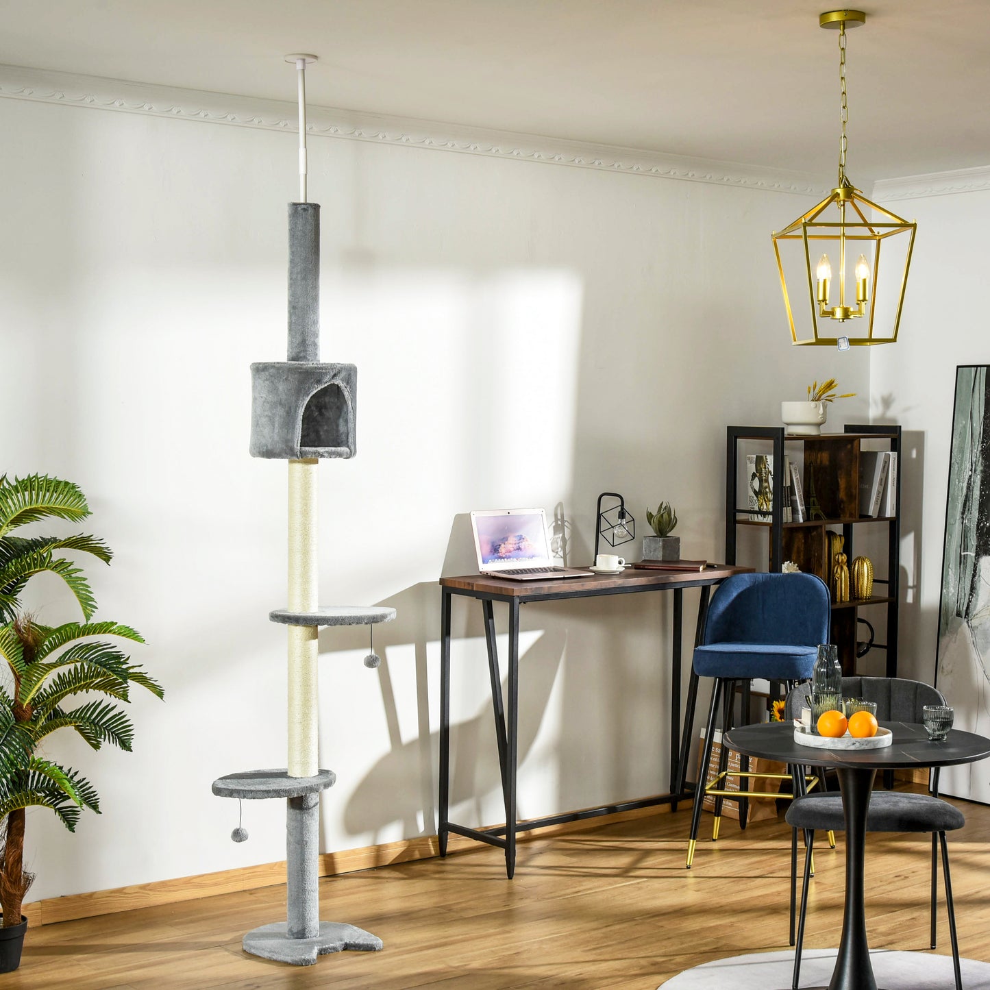 Tall grey cat tree with sisal posts and dangling toy for indoor cats