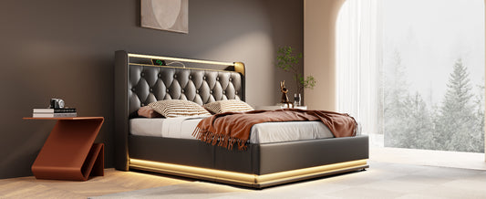 Black tufted leather king bed with integrated LED lighting and charging station