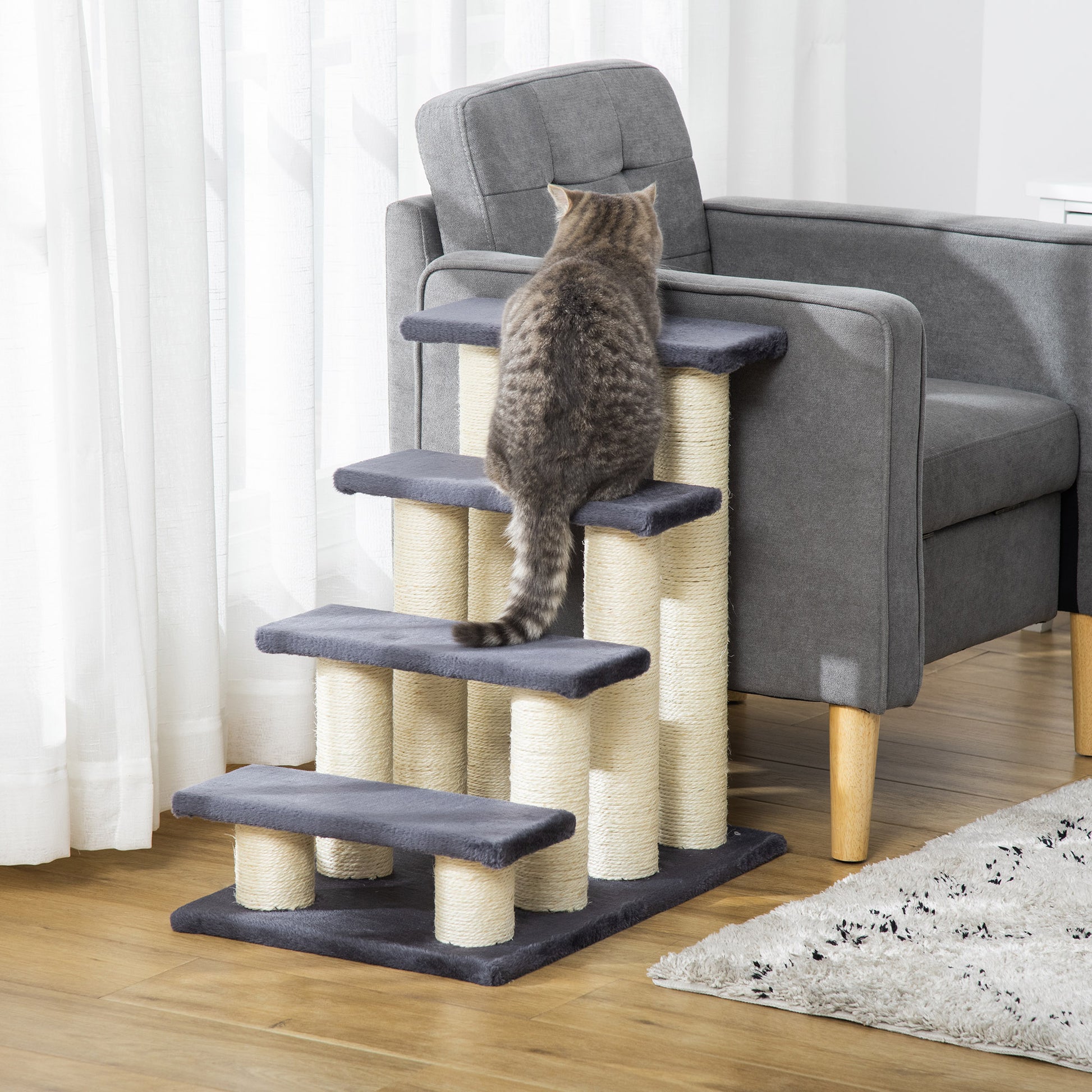 Fourtier grey cat tree with sisal rope scratching posts and plush platforms