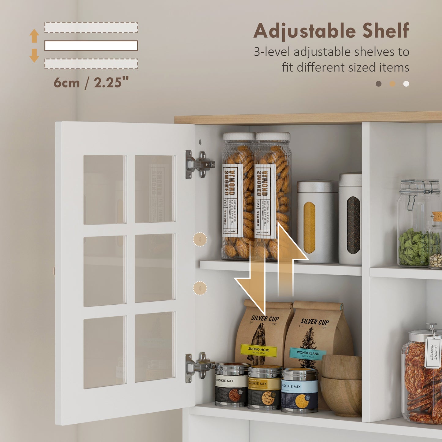 White kitchen cabinet with adjustable shelves holding cookie mix canisters and jars of nuts