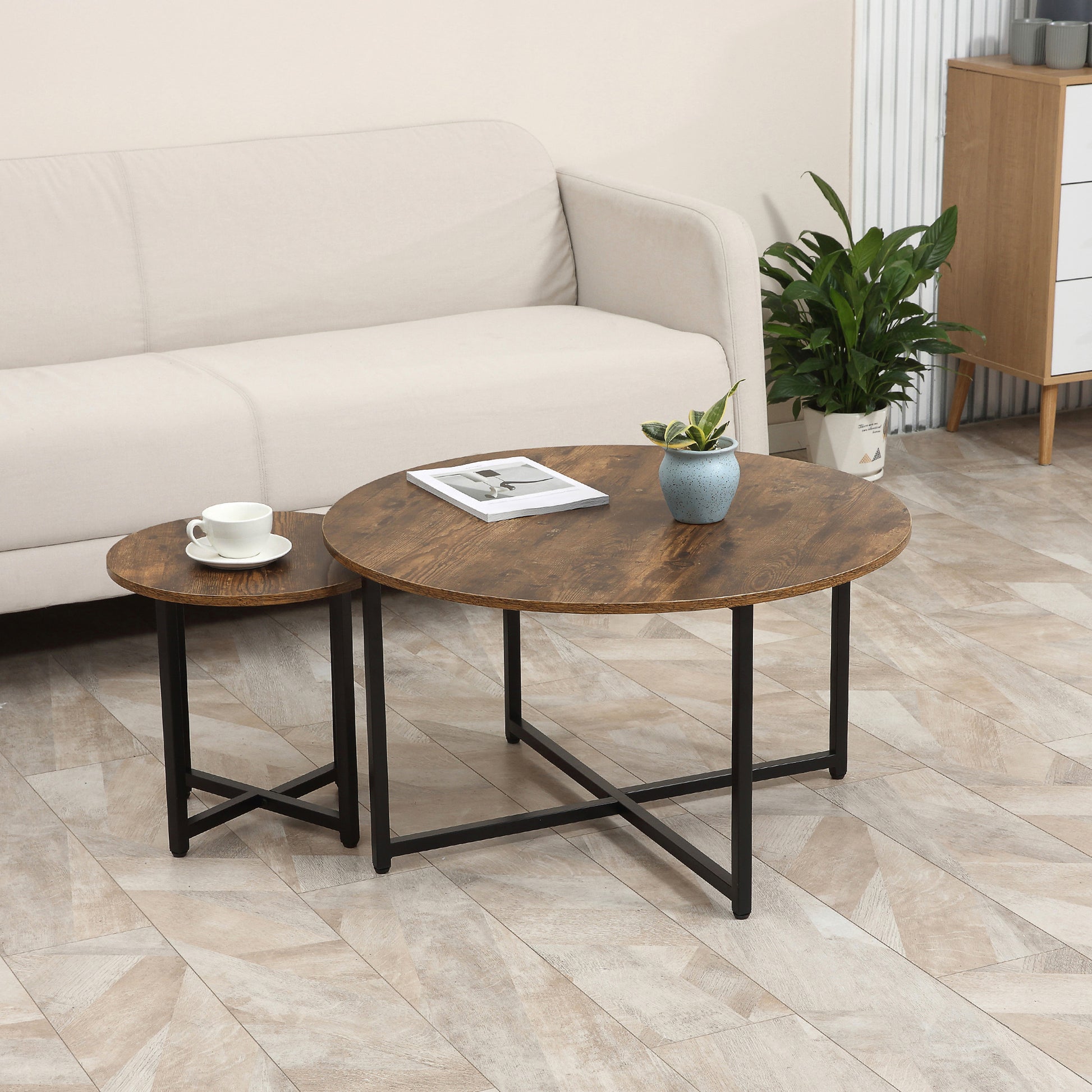 Round wooden nesting coffee tables with black metal legs modern design